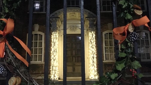 Rainham Hall front gate and door decorated with Christmas Lights
